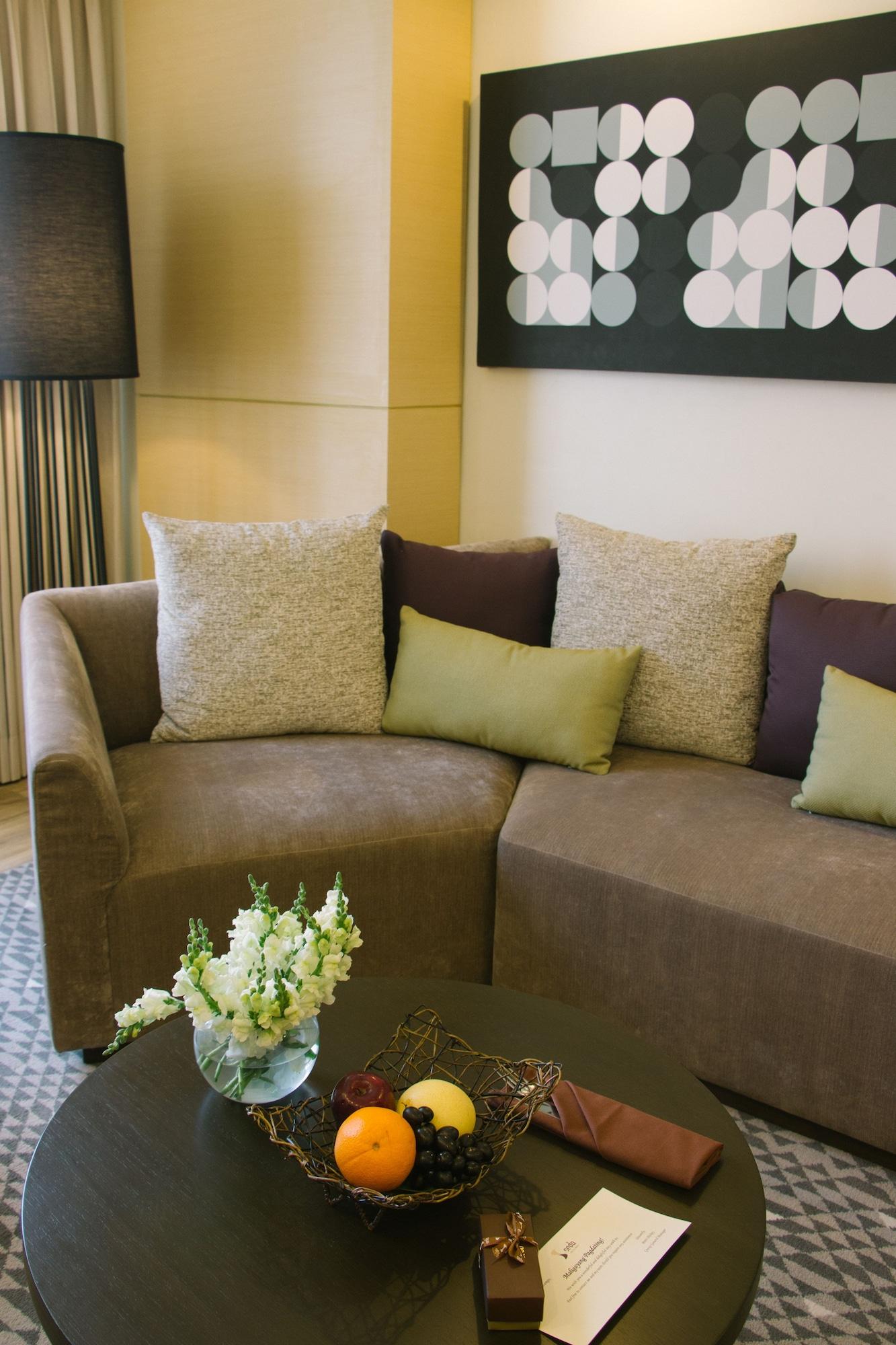 קואזון סיטי Seda Vertis North מראה חיצוני תמונה A sofa with cushions