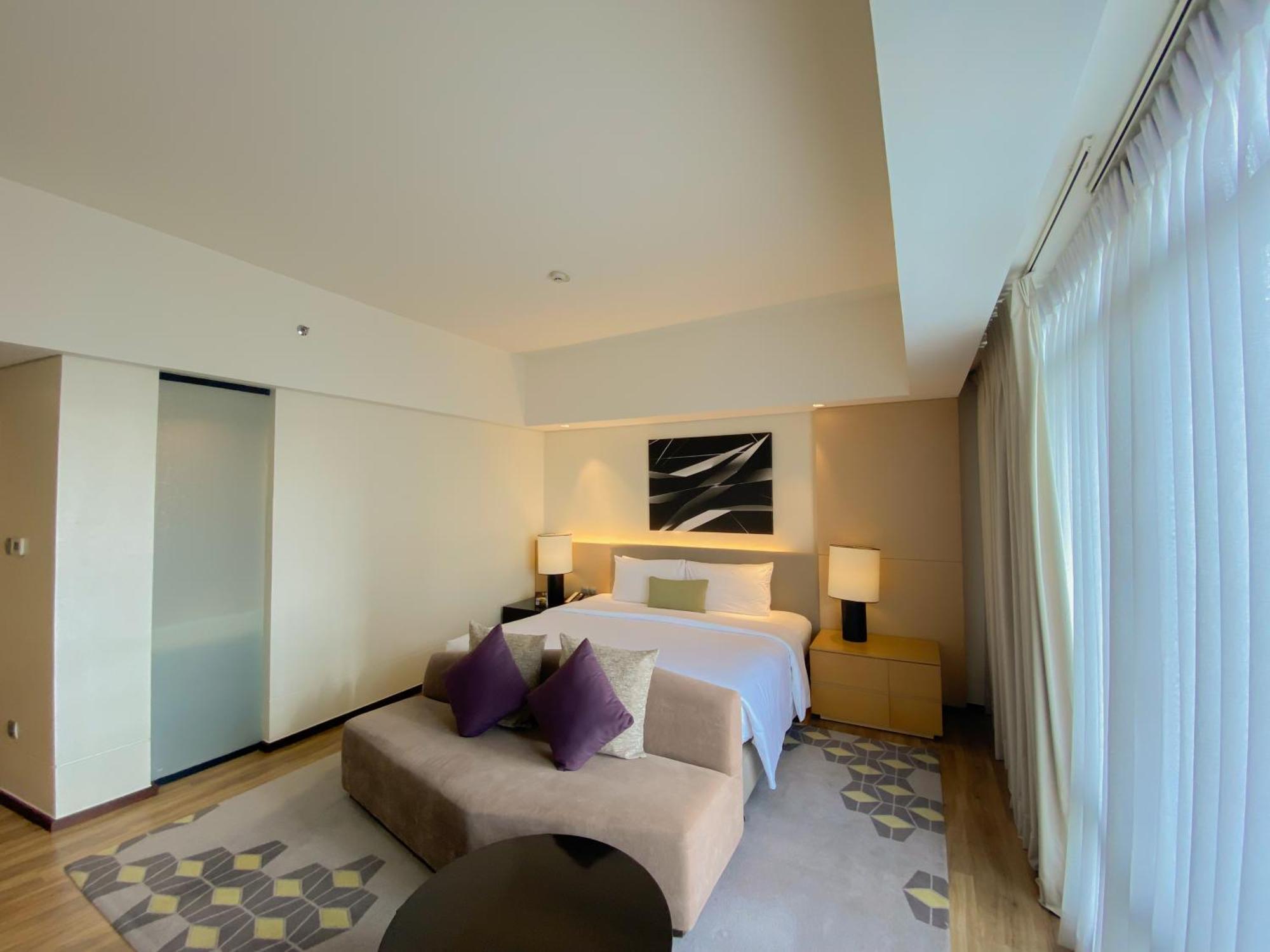 קואזון סיטי Seda Vertis North מראה חיצוני תמונה Deluxe Suite bedroom