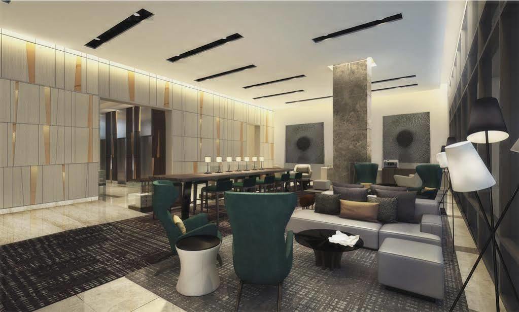 קואזון סיטי Seda Vertis North מראה חיצוני תמונה The lobby of the hotel