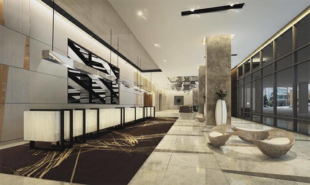 קואזון סיטי Seda Vertis North מראה חיצוני תמונה The lobby of the hotel